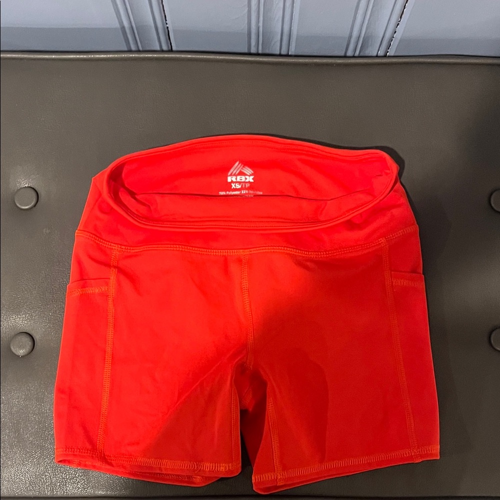 RBX Women's Vibrant Orange Athletic Shorts